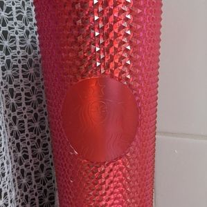 Pink studded Starbucks tumbler